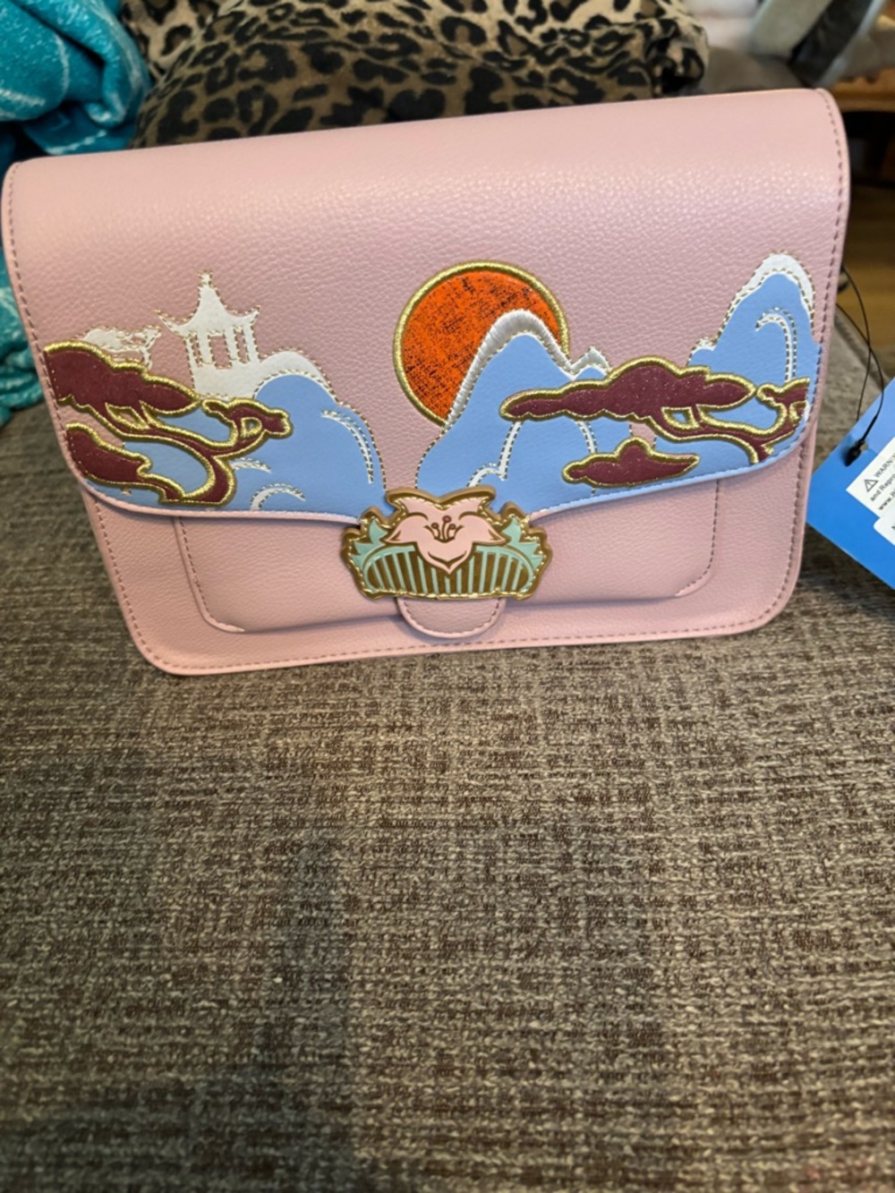 Disney Pink Crossbody with Blue Mountain & Orange Sun Motif